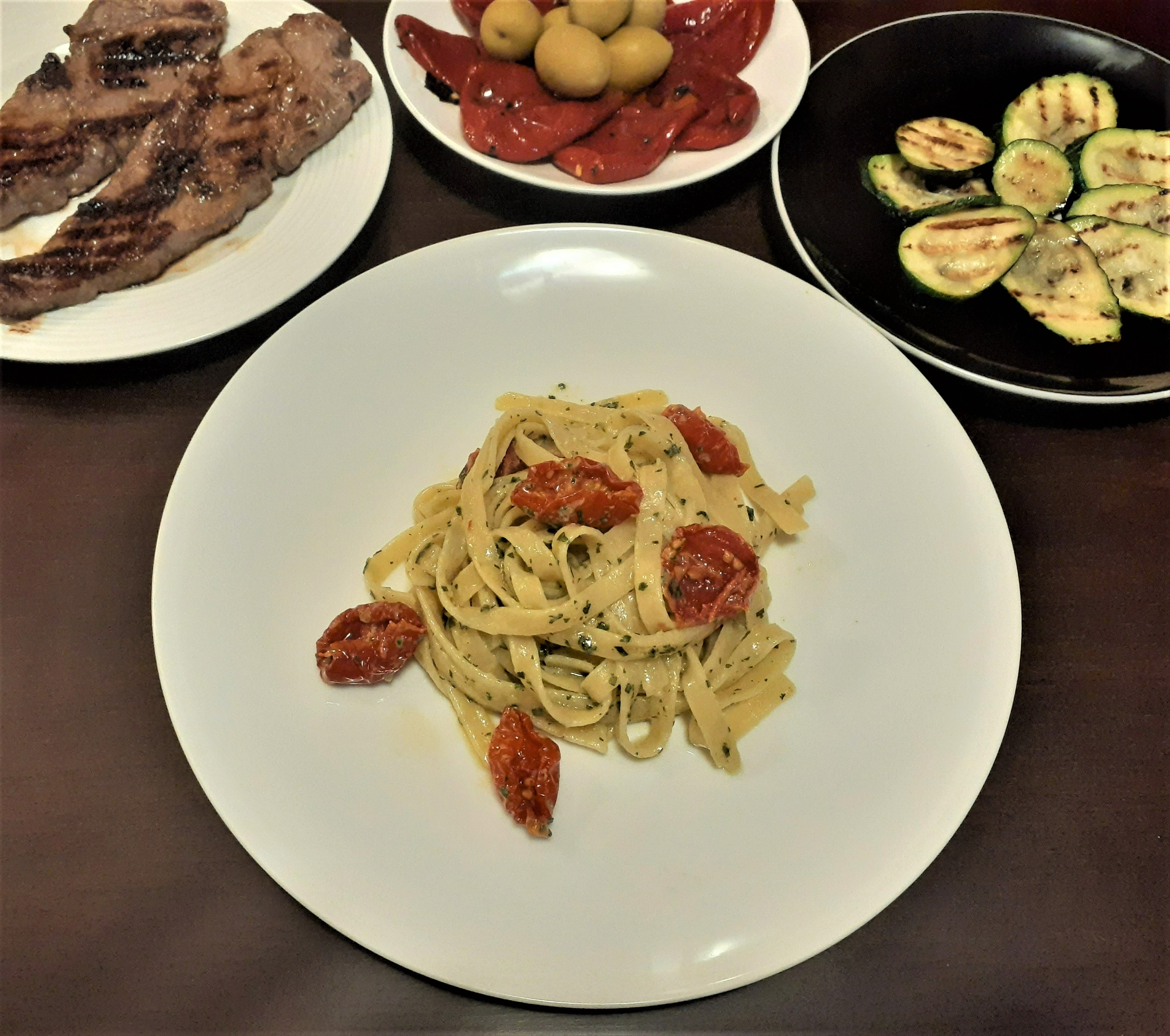 Fettuce with pesto and semi-sundried cherry tomatoes